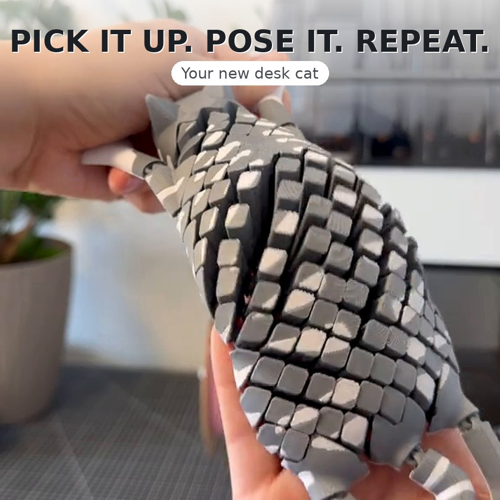 Flexible articulated cat fidget toy in a playful pose